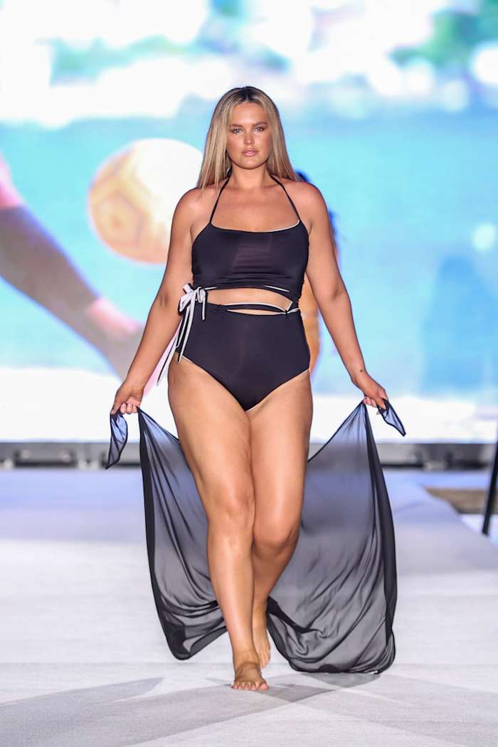Georgina Burke walks the runway for Sports Illustrated Swimsuit Runway Show During Paraiso Miami Beach on July 16, 2022 in Miami Beach, Florida.